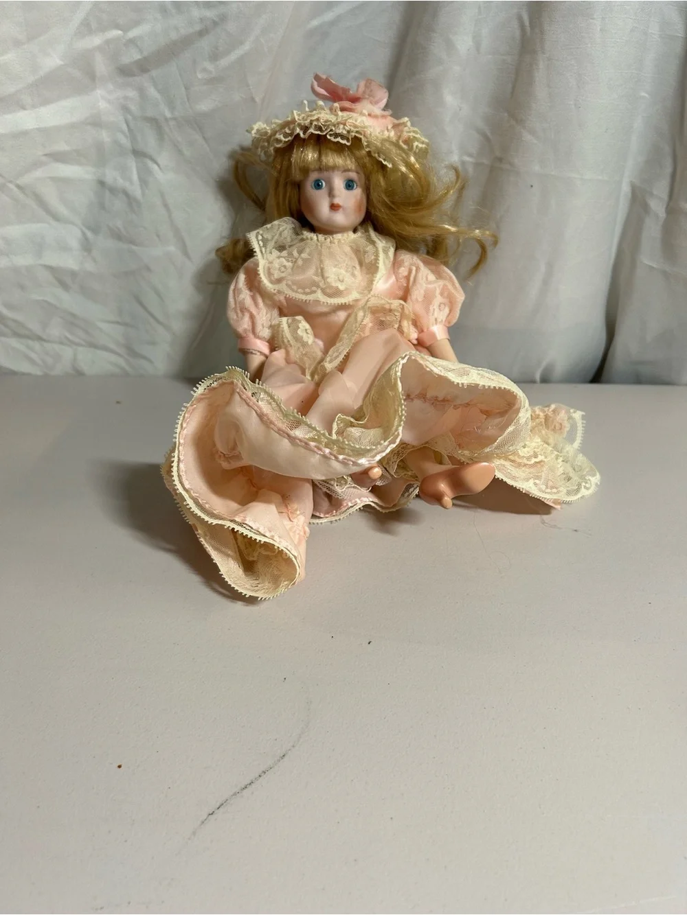 Vintage-Style Porcelain Doll in Soft Pink Lace Dress